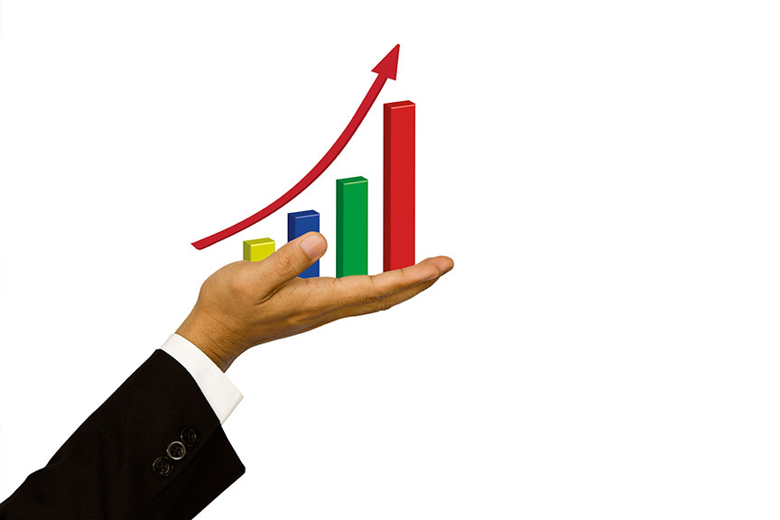 Imagen mano sosteniendo un gráfico de barras